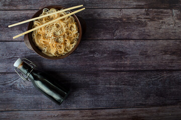 rice noodles with chicken. Fried rice noodles with chicken pieces and vegetables