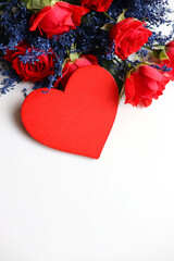 happy valentine's day greeting card. bouquet of flowers and red heart on white background 