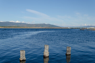 View of the river and mountains in the distance.