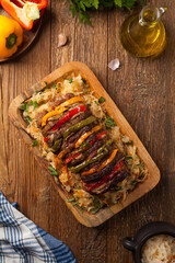 Roasted whole in sauerkraut, stuffed pork neck.