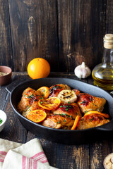 Baked chicken with oranges, garlic and mint. Recipe.