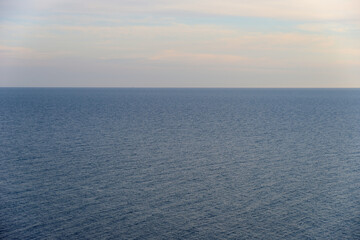 Fototapeta premium Sea surface and cloudy sky as background