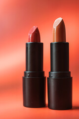 Close-up of lipstick on a red background