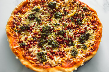 vegan pizza with plant-based bacon pesto and dairy-free cheese, healthy plant-based food