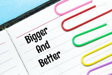 colored clicks, notebooks with the words bigger and better