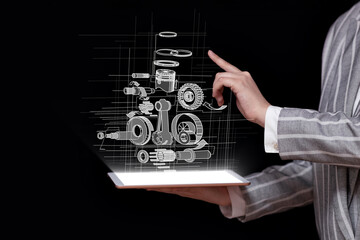 a tablet in the hands of a woman, gears and bearings, engineering concept, design, robotics,...