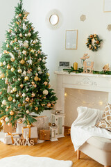 Living room with Christmas decorations. Christmas tree, gift boxes, cozy armchair, pillows, fireplace.