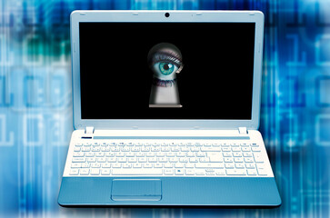 eye observing from keyhole in monitor, hacking and danger in internet