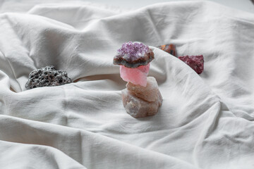 Different minerals on a white background. Amethyst, tiger's eye, meteorite, quartz. Stones on a...