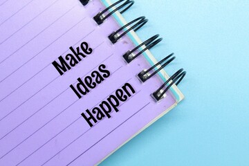 notebook with the words make ideas happen