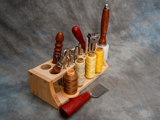 workbench with tools for working with leather products