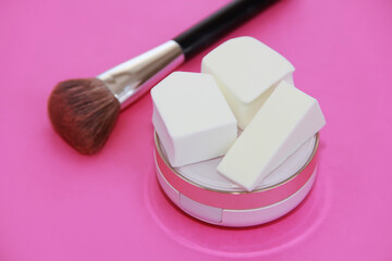 Obraz na płótnie Canvas white foam cosmetic sponges for applying cream