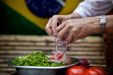 Cooking food. Hands of woman cooking, chopping vegetables in the kitchen. Chef at restaurant cooking. High quality photo