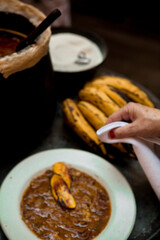 Cooking food. Hands of woman cooking red meat in the kitchen. Chef at restaurant cooking. High quality photo