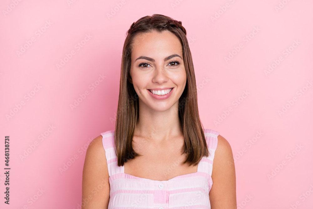 Wall mural photo of happy positive young woman smile good mood enjoy free time isolated on pastel pink color ba