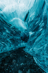blue ice cave of Iceland glacier vertical photo