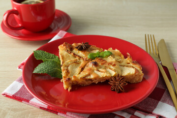 Concept of tasty food with apple pie on wooden background