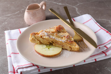 Concept of tasty food with apple pie on textured background