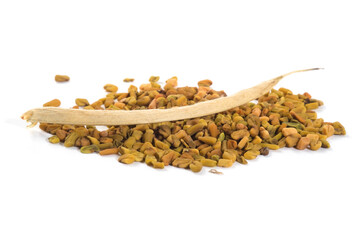 Dried Fenugreek pods and seeds isolated on white background. Trigonella foenum-graecum. Close up view.