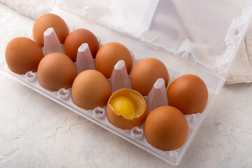 Chicken eggs in shells in container