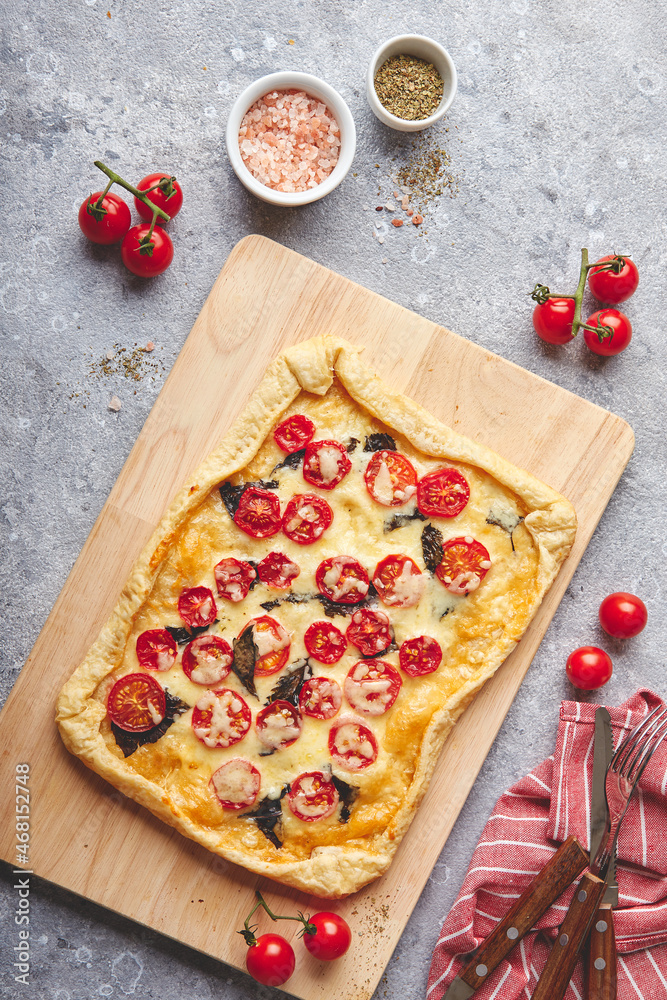 Canvas Prints Puff pastry tart with cherry tomatoes, mozzarella and purple basil