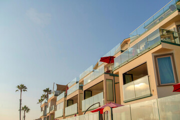 Fototapeta na wymiar Beach house hotel building in a low angle view at Oceanside, California