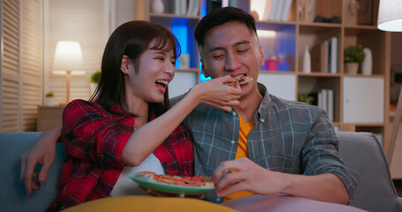 couple watch tv at home