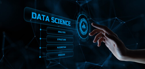Data science analytics technology concept. Hand pressing button on virtual screen.