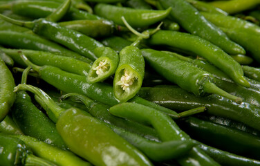 Several peppers are lying on the floor