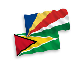 Flags of Co-operative Republic of Guyana and Seychelles on a white background