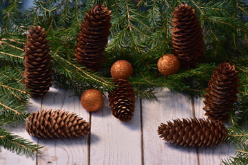 Christmas background of green spruce branches with new year decorations