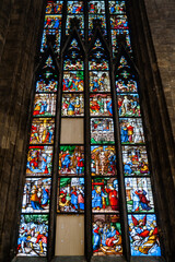 Tall stained glass window of the Duomo. Italy, Milan