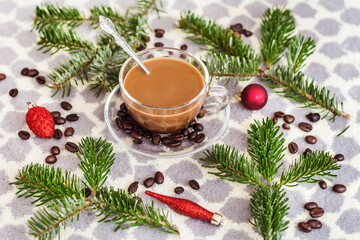  Glass Cup of Coffee with pine branches and Christmas decoration 