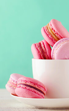 Small Macaron Cookies Bright colors in white coffee cups