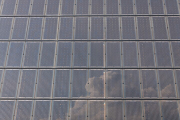 building facade covered with photovoltaic panels