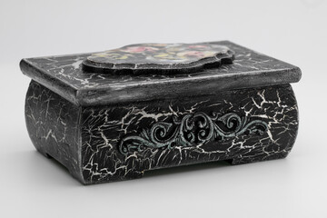 Old vintage jewelry box on white background