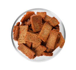 Crispy rusks in bowl isolated on white, top view