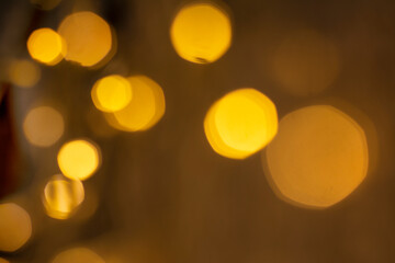 Bokeh. Beautiful New Year bokeh. The Christmas garland glows out of focus.