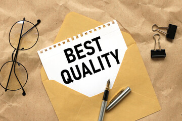 Best Quality. text on white paper on craft envelope. business concept.