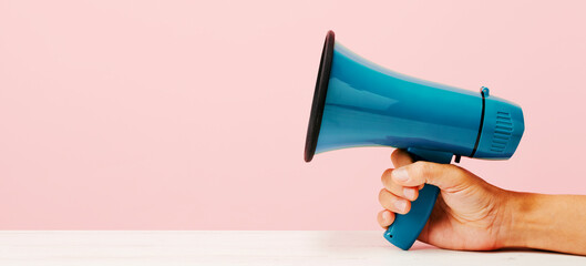 man has a megaphone in his hand, web banner