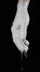 a drenched hand on a black background hangs down