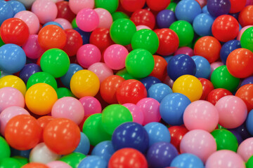 Fototapeta na wymiar Dry pool with colored balls for children