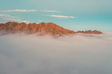 sunset in the mountains with clouds