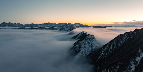 sunset in the mountains with clouds