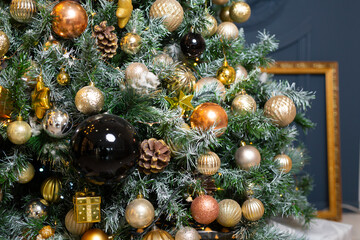 Obraz na płótnie Canvas original New Year's decoration on the tree in dark colors 