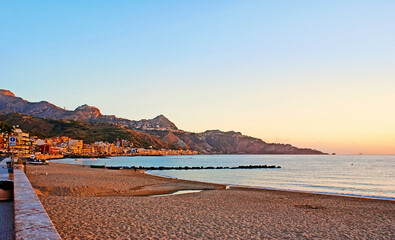 The sunrise beach in Giardini Naxos resort, Sicily, Italy
