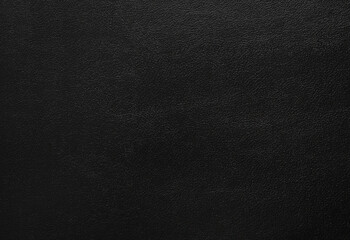 black artificial leather with waves and folds on PVC base