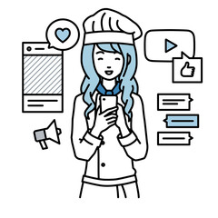 立ってスマートフォンでさまざまなSNSで楽しく交流する調理師の女性