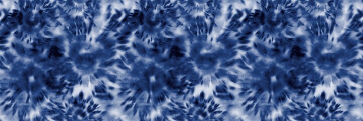 Seamless indigo tie dye 1970s funky hippie repeat pattern swatch motif for surface design and print. High quality illustration. Vibrant navy blue apparel material print. Psychedelic textile design.