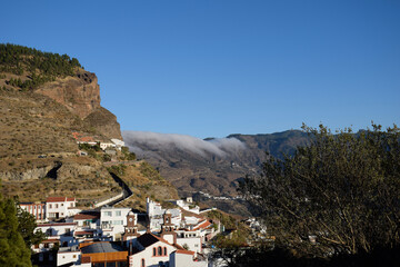 landscape of the town of artenara between mountains and clouds. sky,nature